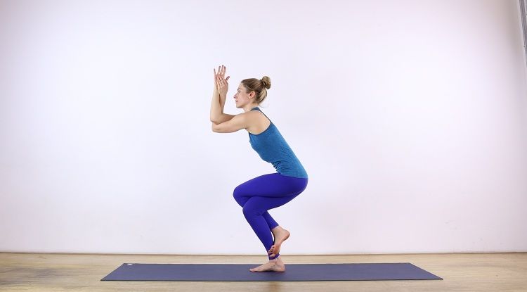 standing head to knee pose