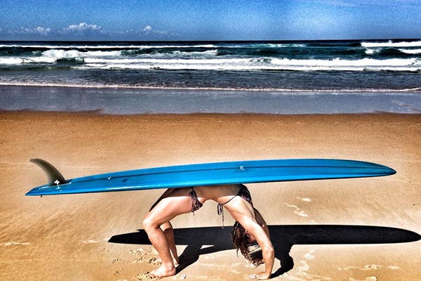 Wheel Pose with Surfboard