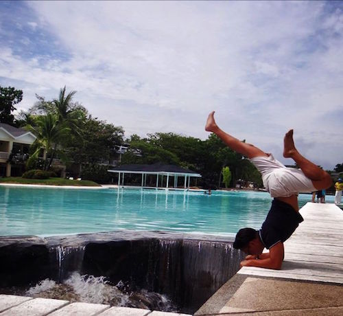 Man in pose by pool